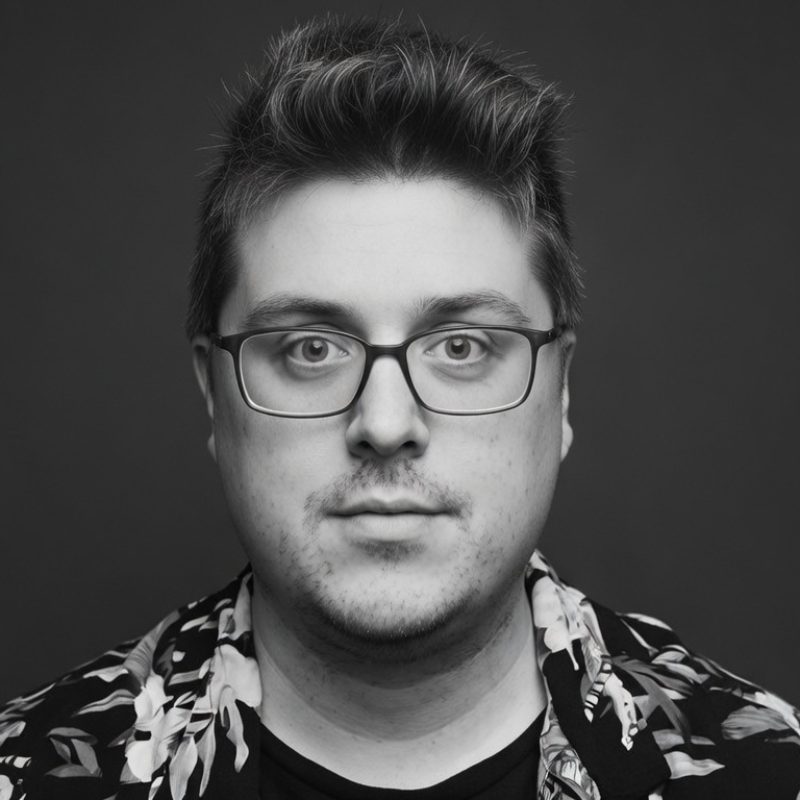 Scott, founder and host of Gunpowder Fiction and Plot — editorial black and white portrait